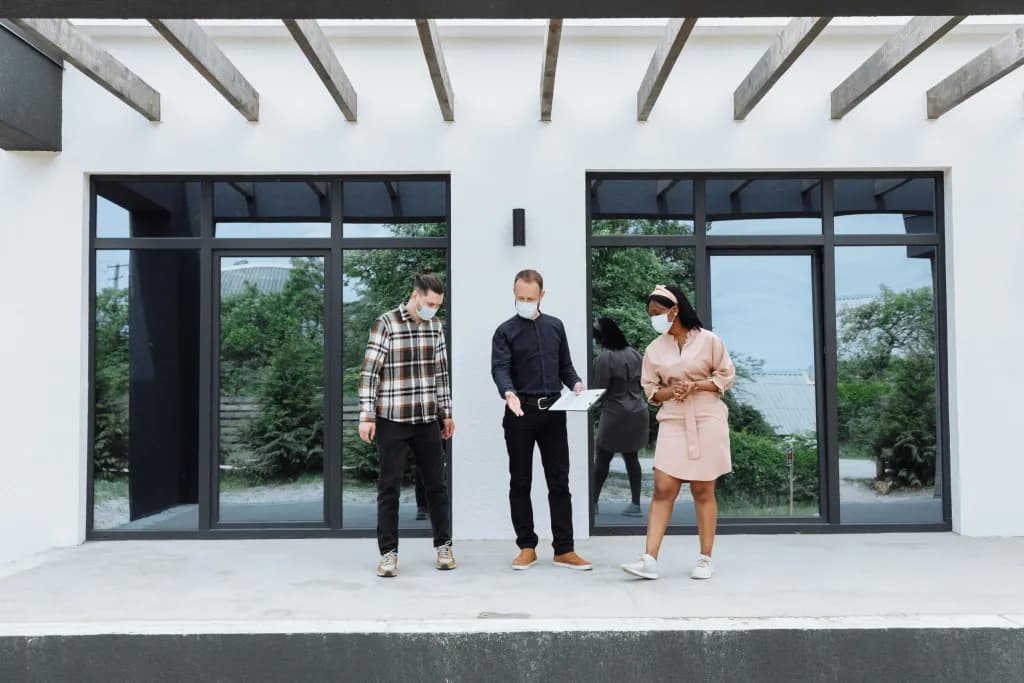 PIDS inspector walking buyers through a newly-built property in Portugal during a pre-handover snag inspection
